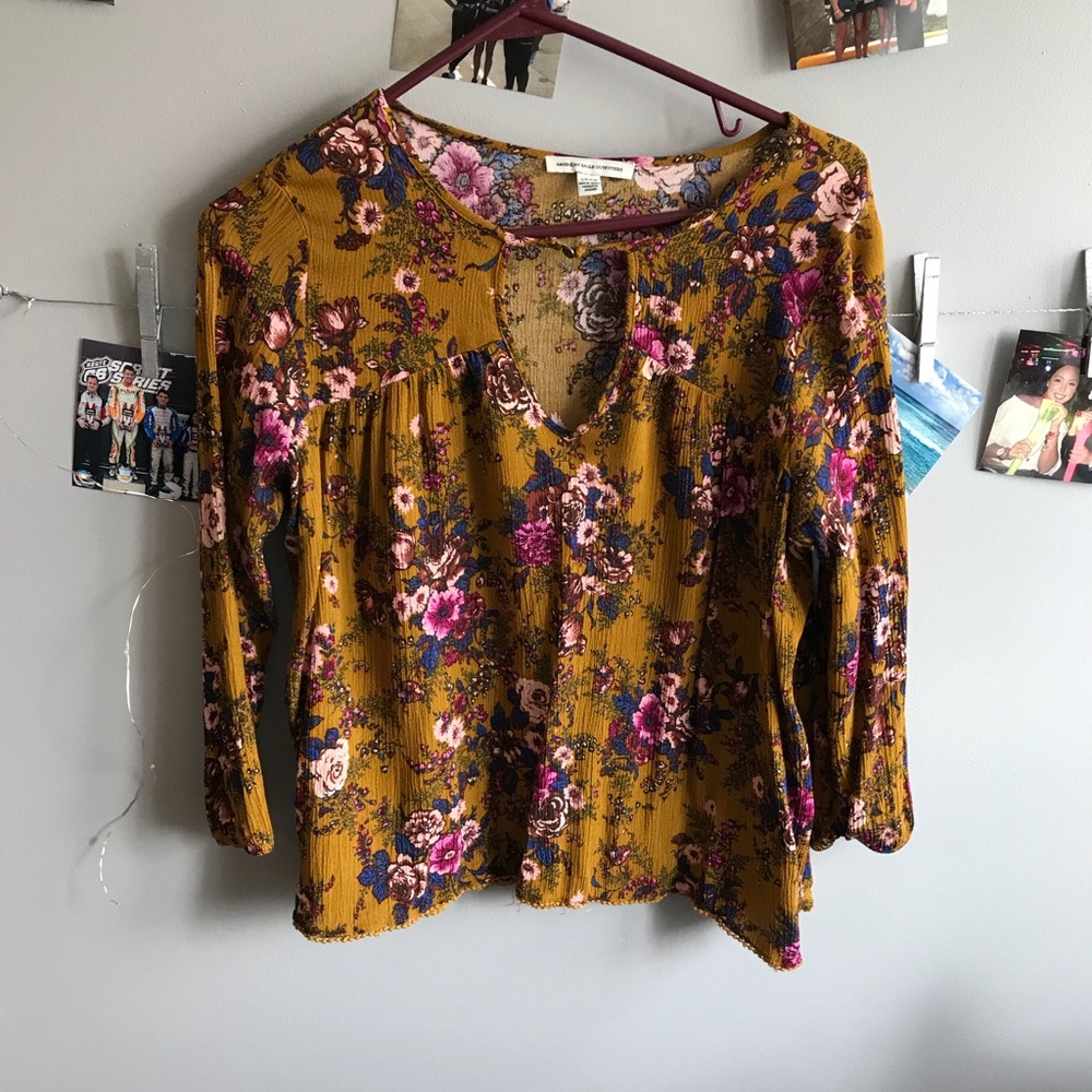 mustard floral blouse